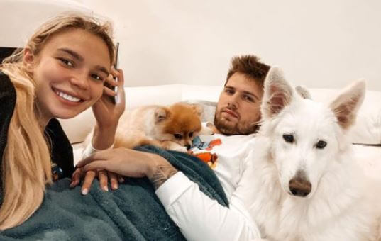 Mirjam Poterbin son Luka Doncic with his girlfriend Anamaria Goltes and their pet dogs.